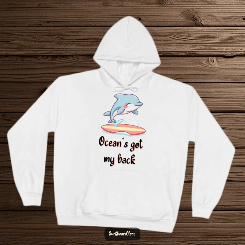 Funny Hoodie: Cheerful dolphin performing an epic joyous leap over a surfboard, perfect for cozy, humorous beach vibes.