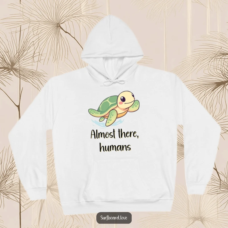 Funny Hoodie: A playful sea turtle paddles rapidly towards shore, offering warmth and a humorous, determined sea vibe.