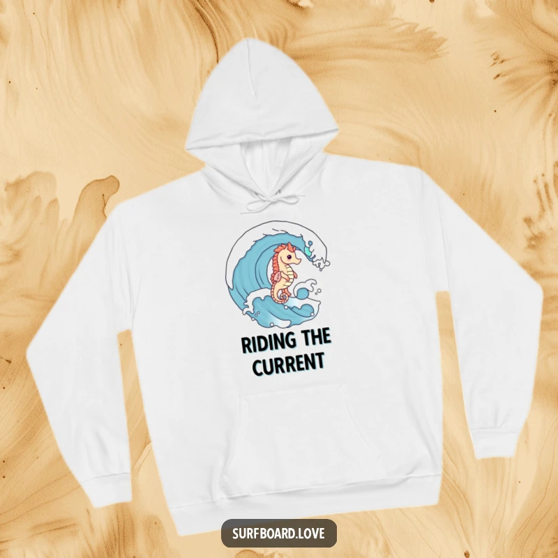 Funny cute seahorse with tiny legs riding a big ocean wave, featured on a warm and humorous hoodie.
